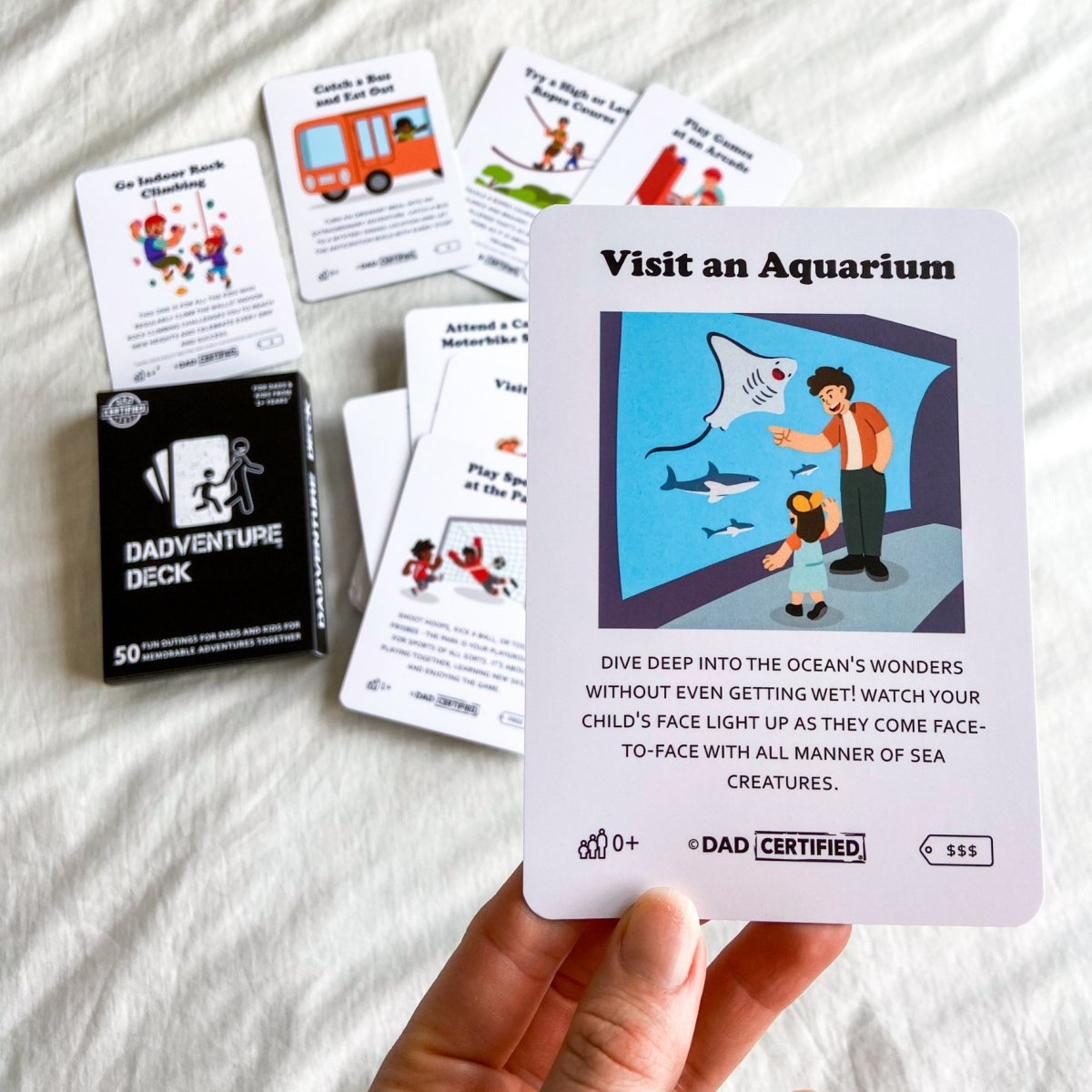 The Dadventure Deck cards fanned out, showing an illustrated activity card